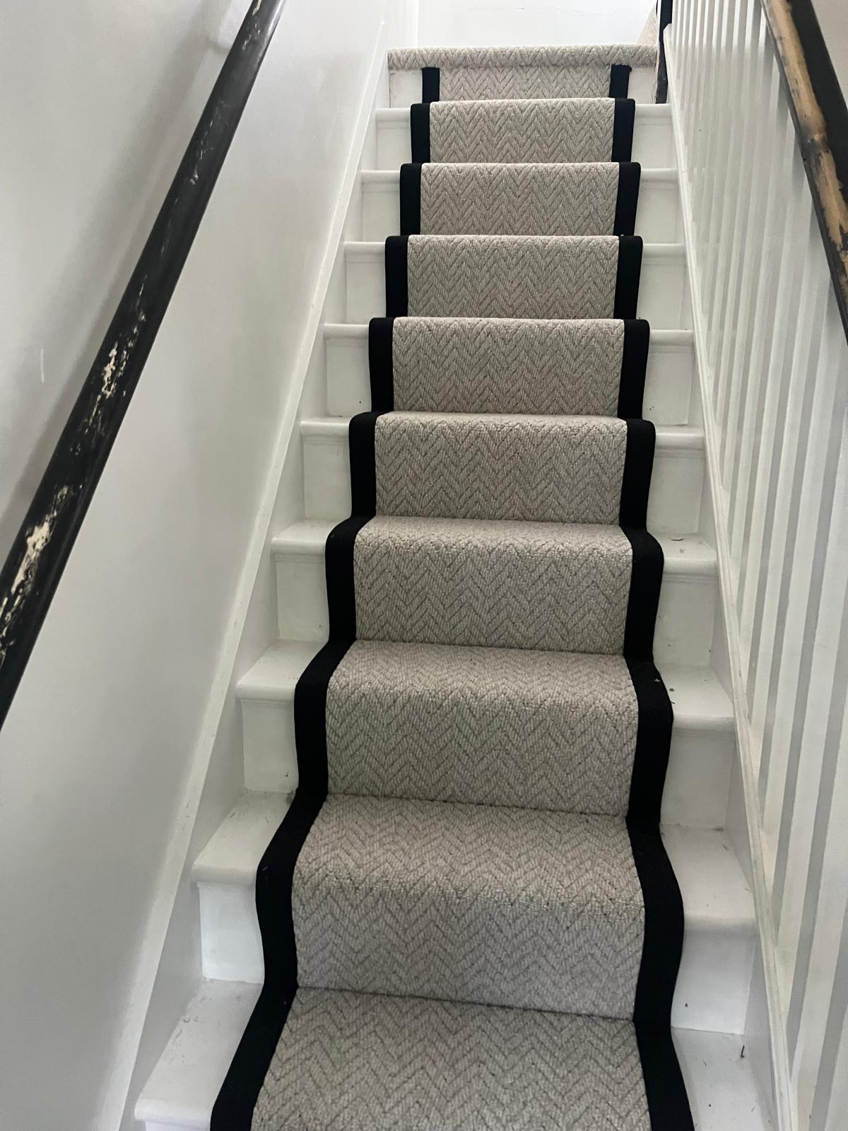 Textures Herringbone Ice stair runner with black binding fitted in Walthamstow E17 by Carpet World London